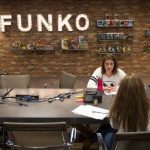Product development manager Corinne Cavalaro, facing, and product manager Stephanie Sisolak talk in the conference room at Funko, a pop culture and licensed-focused collectibles company. (Andy Bronson / The Herald)