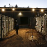 UniEnergy Technologies&rsquo; Russ Weed walks through a testing area for the Mukilteo-based company&rsquo;s container size vanadium batteries Nov. 17. (Ian Terry / The Herald)