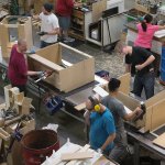 Workers assemble custom cabinets at Canyon Creek Cabinets in Monroe. At its 2007 peak, sales were $92 million with a workforce of 715. Under Bill Weaver&rsquo;s leadership, Canyon Creek successfully survived the recession and downturn in sales. They are surging forward with 2016 projected sales at $60 million and a workforce of 440 employees. (Andy Bronson / The Herald)