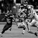 Stephen Brashear / Associated Press                                Seattle wide receiver Tyler Lockett turns the corner on a sweep en route to a 75-yard touchdown run Sunday night at CenturyLink Field in Seattle.