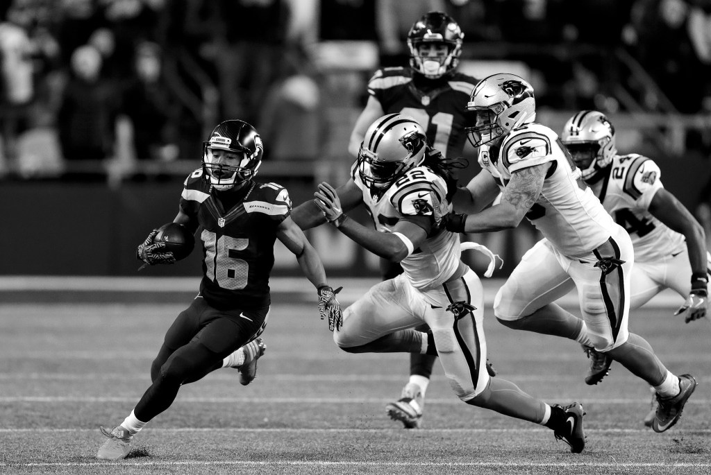 Stephen Brashear / Associated Press                                Seattle wide receiver Tyler Lockett turns the corner on a sweep en route to a 75-yard touchdown run Sunday night at CenturyLink Field in Seattle.