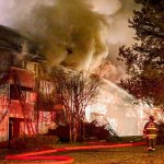 A three-alarm apartment fire at the Bluffs in Everett on Dec. 31, 2015. (Kevin Clark / Herald file)