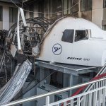 A firefighter stands in the office of Condor airlines next to a burned out Boeing 767 flight simulator at the airport in Frankfurt am Main, Germany, on Thursday. (Frank Rumpenhorst/dpa)