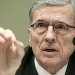In this 2015 photo, Federal Communications Commission Chairman Tom Wheeler testifies before the House Oversight and Government Reform Committee hearing on net neutrality, on Capitol Hill in Washington. Wheeler says he will step down in January 2017 as President-elect Donald Trump takes office. (AP Photo/Lauren Victoria Burke, File)