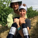 Karl and Coco Umiker stand in their Lewiston, Idaho, vineyard holding bottles of Clearwater Canyon Cellars 2013 Selway Red Wine, which won a double gold at the 2016 San Francisco International Wine Competition. (Photo by Eric Degerman/Great Northwest Wine)