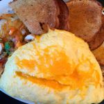 The vegetarian omelet from Jake&rsquo;s Cafe is served with a choice of potatoes and toast. (Andrea Brown / The Herald)