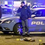 Italian police collect evidence after a shootout with a man near a train station in Milan&rsquo;s Sesto San Giovanni neighborhood in Italy early Friday. Italy&rsquo;s interior minister Marco Minniti says the man killed is &ldquo;without a shadow of doubt&rdquo; the alleged Berlin Christmas market attacker, Anis Amri. (AP Photo/Daniele Bennati)