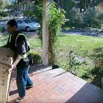 A package thief steals a Christmas gift in South Pasadena, California. (South Pasadena Police Department)