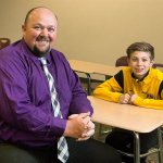 Everett middle school teacher Wayne Thomasson (left) performed the Heimlich Maneuver to dislodge hard candy that his seventh grade student, Gavin Dreben, choked on during class on March 22, 2016. (Ian Terry / Herald file)