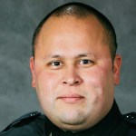 This undated photo provided by the Tacoma Police Department shows officer Reginald &ldquo;Jake&rdquo; Gutierrez, who was shot and killed while responding to a domestic dispute call Wednesday in Tacoma. Gutierrez had served with the department since 1999 and was highly respected and experienced, Tacoma Police Chief Donald Ramsdell said Thursday. (Tacoma Police Department via AP)