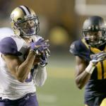 Washington&rsquo;s Dante Pettis (left) runs past California&rsquo;s Chibuzo Nwokocha (16) for a touchdown during the second half of a game Nov. 5 in Berkeley, Calif. (AP Photo/Ben Margot)