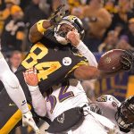 Steelers wide receiver Antonio Brown (84) reaches the ball across the goal line for a touchdown during the second half of a game against the Ravens on Sunday in Pittsburgh. (AP Photo/Fred Vuich)
