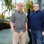 Sandeep Pandya, left, president of Netradyne, stands with Adam Kahn, vice president for fleets. Their company specializes in artificial intelligence for commercial vehicle fleets. (Don Boomer / Union-Tribune)