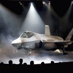 In this 2006 photo, the Lockheed Martin F-35 Joint Strike Fighter is shown after it was unveiled in a ceremony in Fort Worth, Texas. Shares of Lockheed Martin fell Monday, Dec. 12, as President-elect Donald Trump tweeted that making F-35 fighter planes is too costly and that he will cut &ldquo;billions&rdquo; in costs for military purchases. (AP Photo/LM Otero, File)
