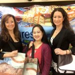 CEO Della Simpson, Pang Kou Her and Kari Brizus of Relan model reusable bags made from vinyl banners that are no longer headed for landfills by companies such as the Getty Museum and United Airlines. (Neal St. Anthony / Star Tribune)