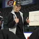Lexi Bender looks for questions after giving instructions at a women&rsquo;s hockey clinic she co-hosted Friday afternoon at Xfinity Arena in Everett. Bender, who is from Snohomish, is a professional hockey player with the Boston Pride of the National Women&rsquo;s Hockey League. (Kevin Clark / The Herald)