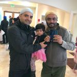 The Sikh Center of Seattle, located in Bothell, held a health camp Nov. 20 to serve the community. The event concluded with volunteer appreciation honors. Rahul Kaul (left) presents volunteer mentor Balwant Aulck with a trophy. (Contributed photo)