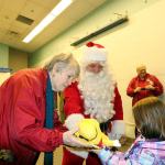 Santa (aka John Bruce) and his elf helper, Sonia Rahm, both from the Snohomish Tillicum Kiwanis, recently visited the Early Childhood Education and Assistance Program at Central Primary Center in Snohomish to deliver presents and other goodies. (Contributed photo)