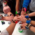 Eisenhower Middle School students show the micro:bits they&rsquo;ve created using technology received from Microsoft&rsquo;s educational outreach program. (Contributed photo)