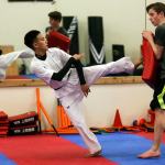 Balil Hasan, 15, sophomore at Kamiak High School works out at Lee&rsquo;s Martial Arts Academy Thursday night in Lynnwood on December 2, 2016. Hasan is a member of the USA Taekwondo Junior National Team and recently competed at the World Junior Championships in Canada. (Kevin Clark / The Herald)