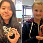 Jasmine Tran (left photo) and Serafima Ermokhina display the ornaments they made that now hang on the Christmas tree at the governor&rsquo;s mansion in Olympia. Students in teacher Mari Atkinson&rsquo;s art class at Olympic View Middle School were selected to help with this year&rsquo;s decorations. (Contributed photo)