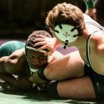 Edmonds-Woodway&rsquo;s Abdoulie Jatta works to hold Everett&rsquo;s Jake Leonard in bounds during a 182-pound match Thursday at Edmonds-Woodway High School. (Kevin Clark / The Herald)