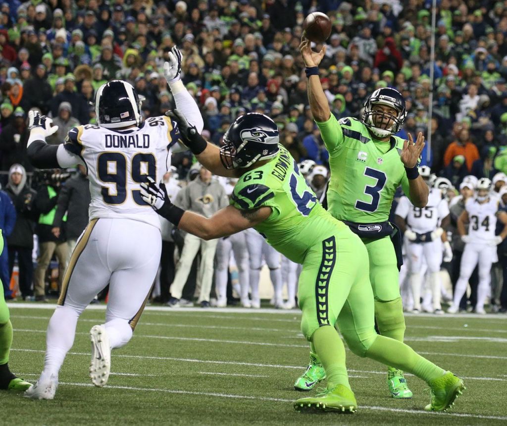 Seahawks quarterback Russell Wilson throws a touchdown to Seahawks wide receiver Doug Baldwin at CenturyLink Field Thursday night in Seattle on December 15, 2016. (Kevin Clark / The Herald)