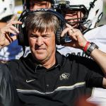 Colorado head coach Mike MacIntyre works the sidelines during a game against Oregon in September. MacIntyre is The Associated Press college football Coach of the Year after leading the Buffaloes to a 10-3 record and their first bowl game since 2007. (AP Photo/Thomas Boyd, File)