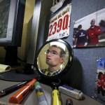 Joe Godfrey works on a computer-mapping project of a section of the Pilchuck River near Snohomish last month. Godfrey started full-time with the Public Works Department this summer and is an avid runner in his spare time. (Ian Terry / The Herald)