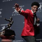 Louisville quarterback Lamar Jackson poses after winning the Heisman Trophy on Saturday in New York. Jackson was named the AP College Football Player of the Year on Tuesday. (AP Photo/Julie Jacobson, File)