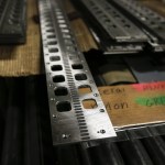 Machined parts are seen at RB Enterprises in Mukilteo on Wednesday. (Ian Terry / The Herald)