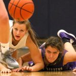 Glacier Peak&rsquo;s Abbie Juozapaitis (left) and Lake Stevens&rsquo; Taylor Smith battle for a loose ball Wednesday night at Glacier Peak High School in Snohomish. (Kevin Clark / The Herald)