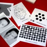 Optical illusion cards sit on a table at the &ldquo;I Can&rsquo;t Believe My Eyes&rdquo; science event, part of Sno-Isle and Imagine Children&rsquo;s Museum&rsquo;s Winter Break science activities for kids, held at the Lynnwood Public Library on Dec. 22 in Lynnwood. (Andy Bronson / The Herald)
