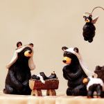 Visitors look over nearly 400 Nativity scenes, including this bear themed one. (Andy Bronson / The Herald)