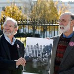 Michael, left, and Robert Meeropol, the sons of Ethel Rosenberg, pose similar to an old photograph of them, before they attempt to deliver a letter to President Barack Obama in an effort to obtain a exoneration for their mother Ethel Rosenberg, in front of the White House, on Thursday, Dec. 1, in Washington. Ethel Rosenberg was executed, along with her husband, Julius, in 1953 after being convicted in a Cold War atomic spying case that captivated the country. (AP Photo/Alex Brandon)