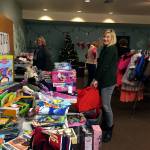 Insurance Services Group of Edmonds helped set up the Washington Kids Christmas Shop, where local families were able to shop for gifts to give their children. (Contributed photo)
