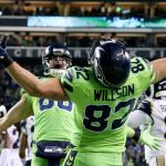 Seahawks tight end Luke Willson, right, celebrates his touchdown with Seahawks tight end Jimmy Graham at CenturyLink Field Thursday night in Seattle on December 15, 2016. (Kevin Clark / The Herald)