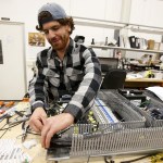 Donnie Connor, an electrician, works on an electrical panel to be installed inside one of the company&rsquo;s vanadium batteries. (Ian Terry / The Herald)