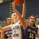 Glacier Peak&rsquo;s Haley Grambo (left) and Lake Stevens&rsquo; Taylor Smith vie for control of a rebound Wednesday night at Glacier Peak High School in Snohomish. (Kevin Clark / The Herald)