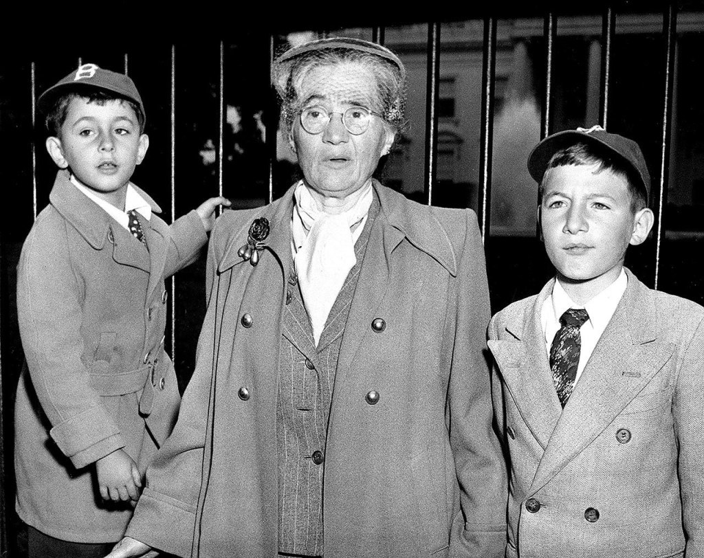 In this June 14, 1953 photo, Sophie Rosenberg is shown with her grandsons Robert, 6, left, and Michael, 10, outside the White House in Washington, D.C., during a demonstration seeking clemency for her son Julius and daughter-in-law Ethel Rosenberg. The sons of convicted spy Ethel Rosenberg are asking President Barack Obama to exonerate their mother. (AP Photo)