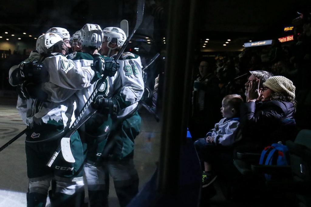 Silvertips players celebrate a goal in the first period Wednesday night at Xfinity Arena in Everett. (Kevin Clark / The Herald)