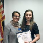 Cassie Franklin, South Everett-Mukilteo Rotary Club president, congratulates Mariner High School senior Galina Prozapas as one of the club&rsquo;s Students of the Month for November. (Contributed photo)