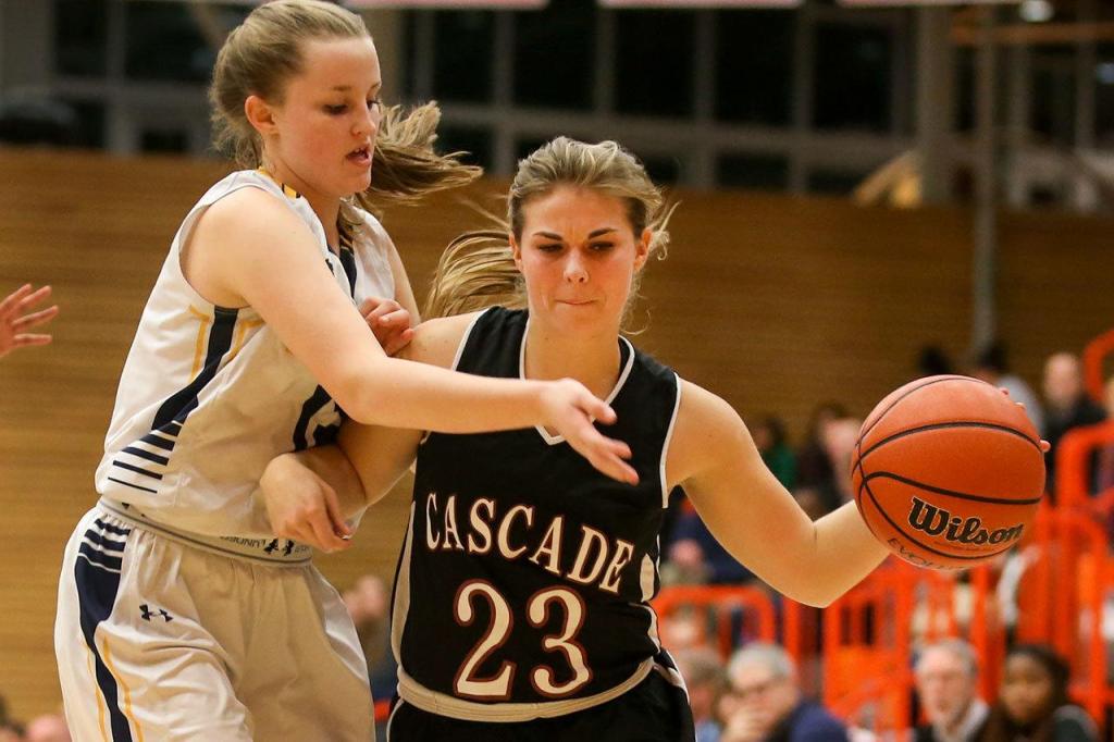 Cascade&rsquo;s Jessica Welch controls the ball with Everett&rsquo;s Brooklyn Johnson defending during the annual Battle of Broadway Friday night at Everett Community College on December 2, 2016. (Kevin Clark / The Herald)