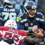 Seahawks quarterback Russell Wilson is sacked by Cardinals linebacker Chandler Jones Saturday afternoon at CenturyLink Field in Seattle on December 24, 2016. The Cardinals won 34-31. (Kevin Clark / The Herald)