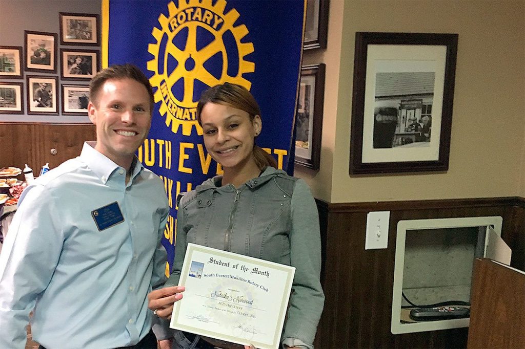 South Everett-Mukilteo Rotary president nominee Dan Leach congratulates ACES High School senior Natasha Norwood on being named one of the club&rsquo;s Students of the Month for November. (Contributed photo)