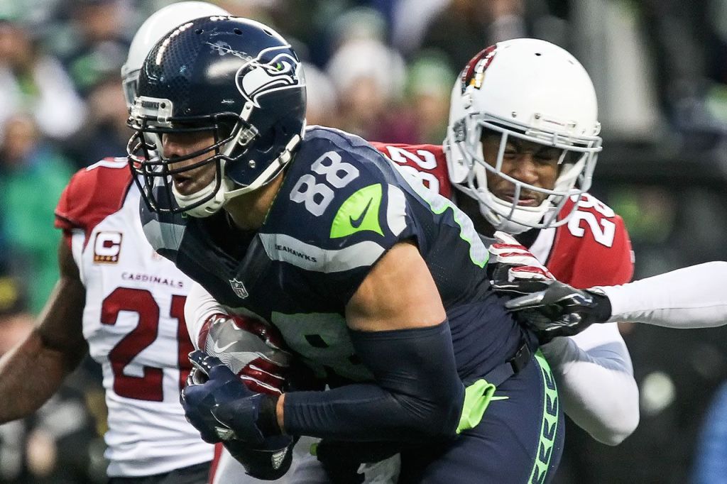 Seahawks tight end Jimmy Graham fends off Cardinals corner back Justin Bethel for a touchdown Saturday afternoon at CenturyLink Field in Seattle on December 24, 2016. The Cardinals won 34-31. (Kevin Clark / The Herald)