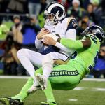 Seahawks defensive lineman Frank Clark sacks Rams quarterback Jared Goff in the first quarter at CenturyLink Field Thursday night in Seattle on December 15, 2016. (Kevin Clark / The Herald)