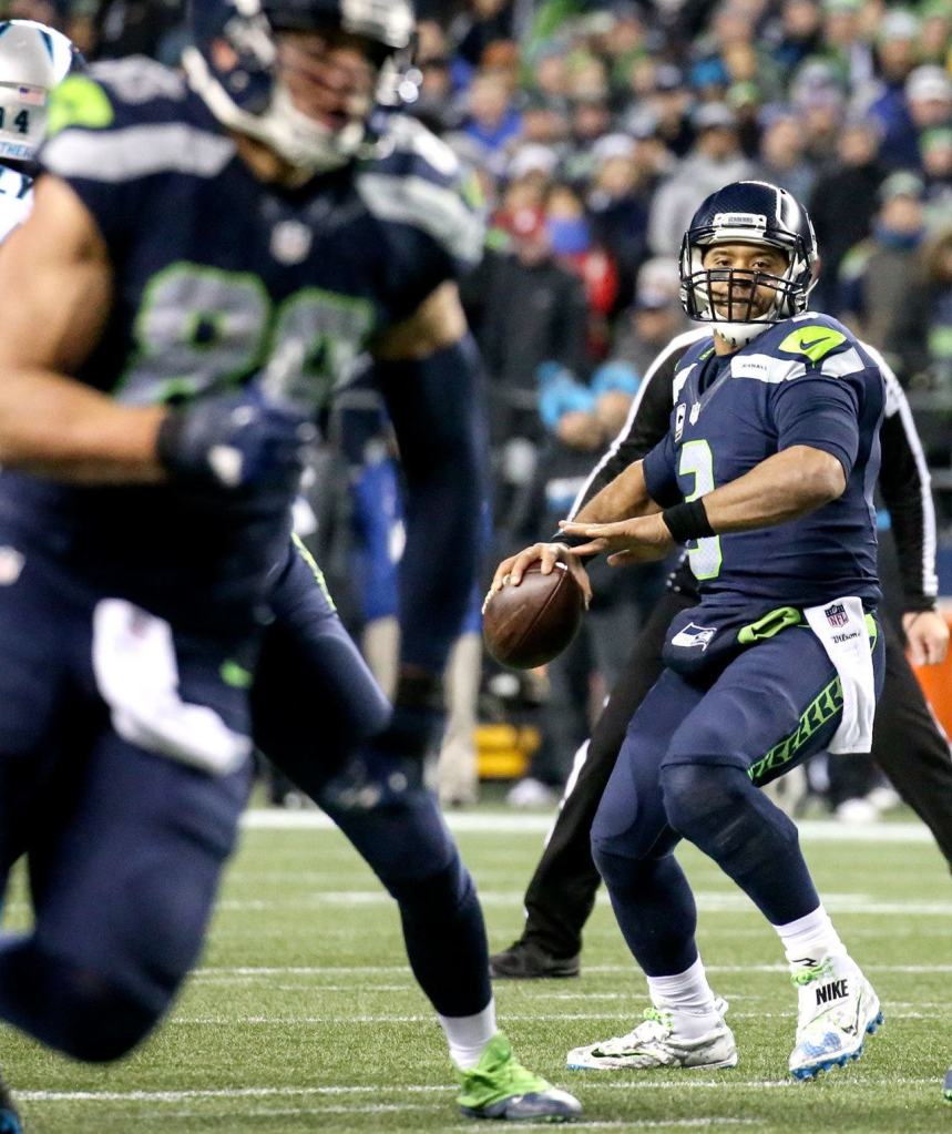 Seahawks quarterback Russell Wilson tracks Seahawks tight end Jimmy Graham on a route against the Panthers Sunday night at CenturyLink Field in Seattle on December 4, 2016. (Kevin Clark / The Herald)