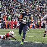 Seahawks wide receiver Doug Baldwin scores a touchdown against the Cardinals Saturday afternoon at CenturyLink Field in Seattle on December 24, 2016. The Cardinals won 34-31. (Kevin Clark / The Herald)