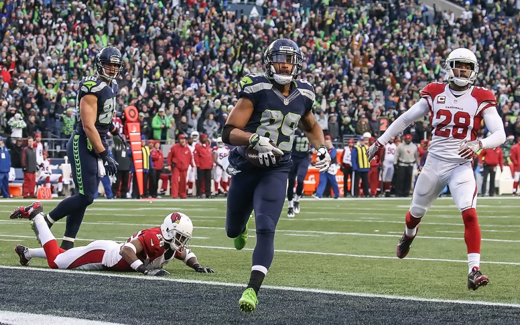 Seahawks wide receiver Doug Baldwin scores a touchdown against the Cardinals Saturday afternoon at CenturyLink Field in Seattle on December 24, 2016. The Cardinals won 34-31. (Kevin Clark / The Herald)